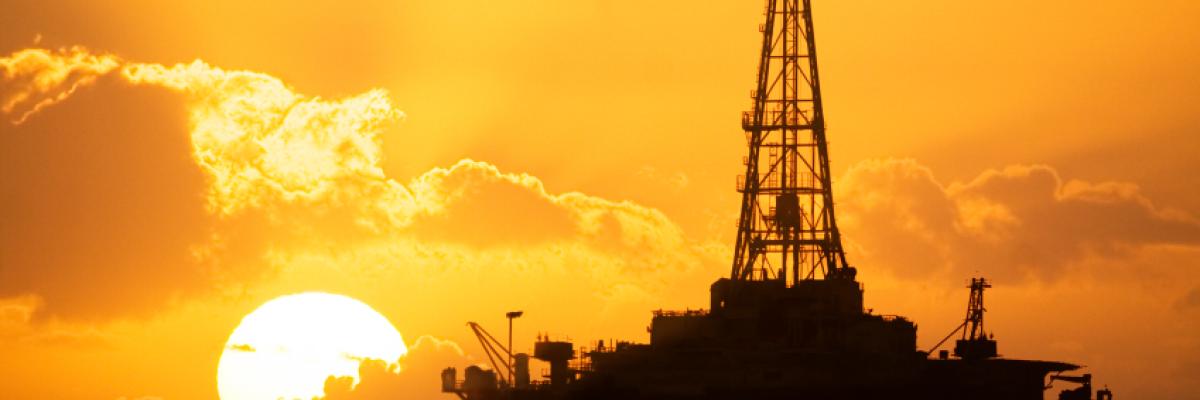 Oil rig and sunset